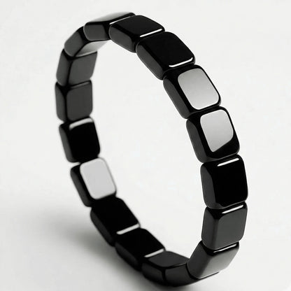 Bracelet Hemalis en hématite — détail des perles polies 8 mm